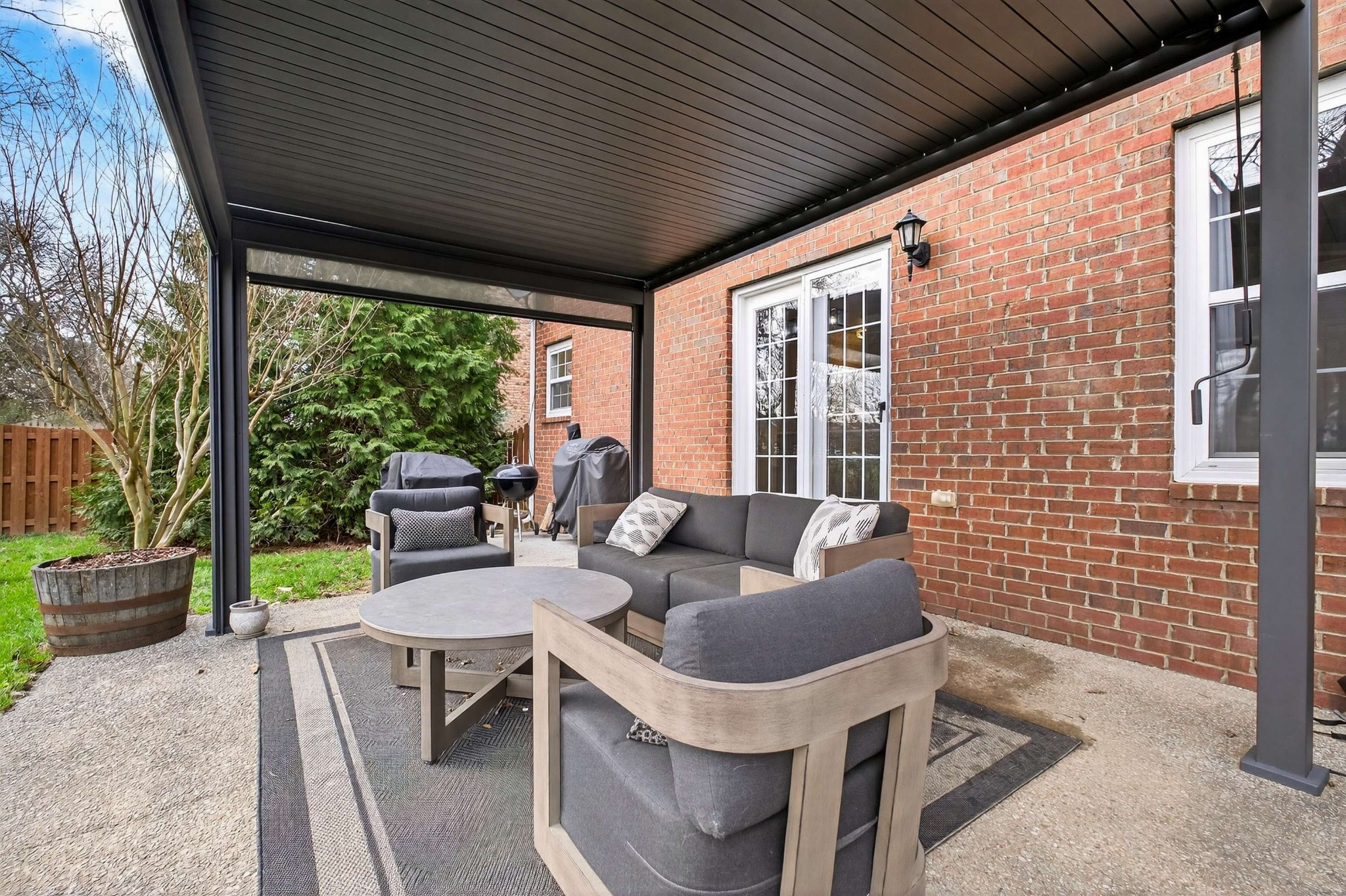 1012 Belcor Drive Spring Hill, TN 37174 - Photo 32 of 40 a outdoor living space with furniture and a potted plant