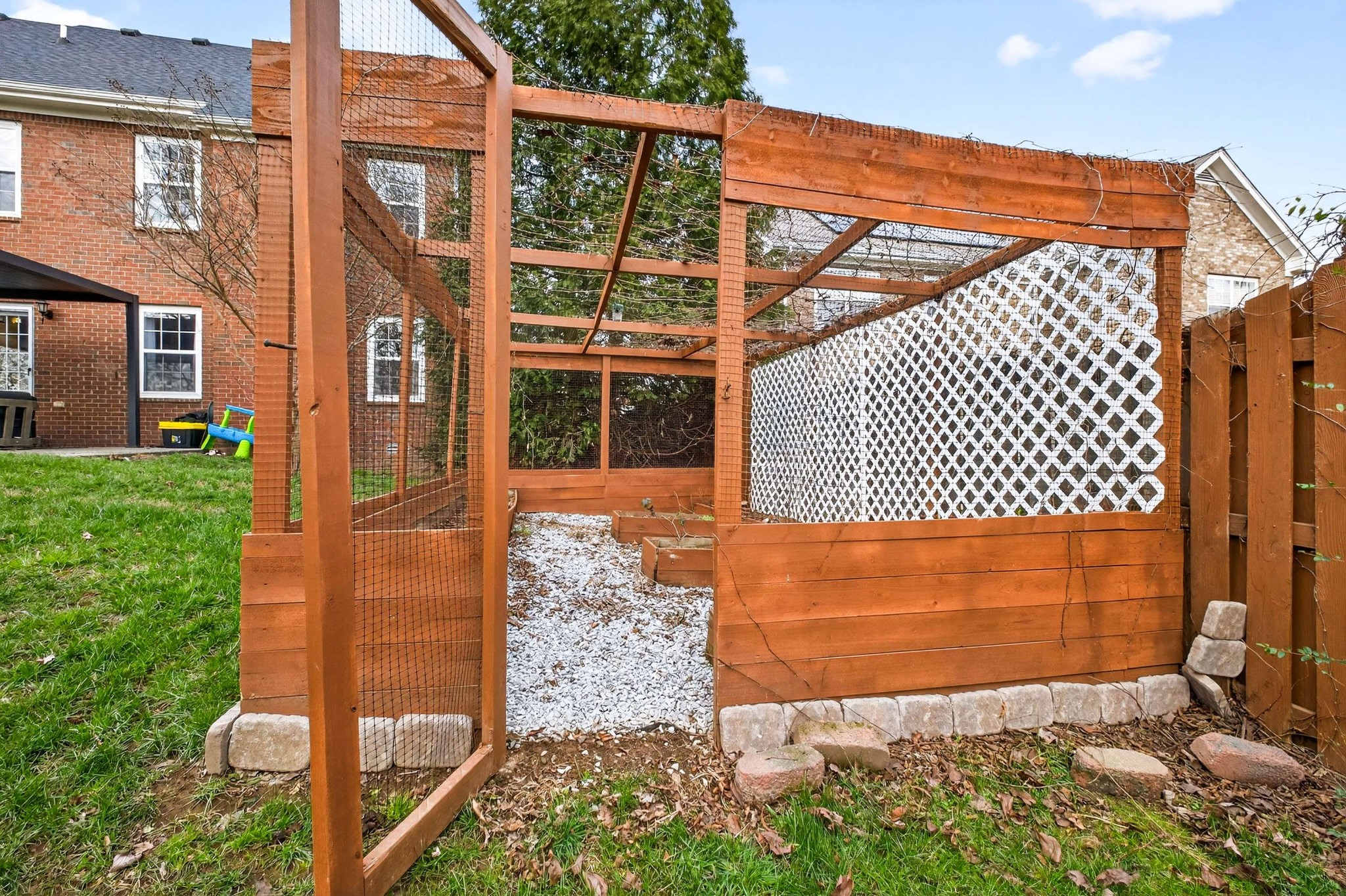 1012 Belcor Drive Spring Hill, TN 37174 - Photo 34 of 40 a view of a backyard with a garden