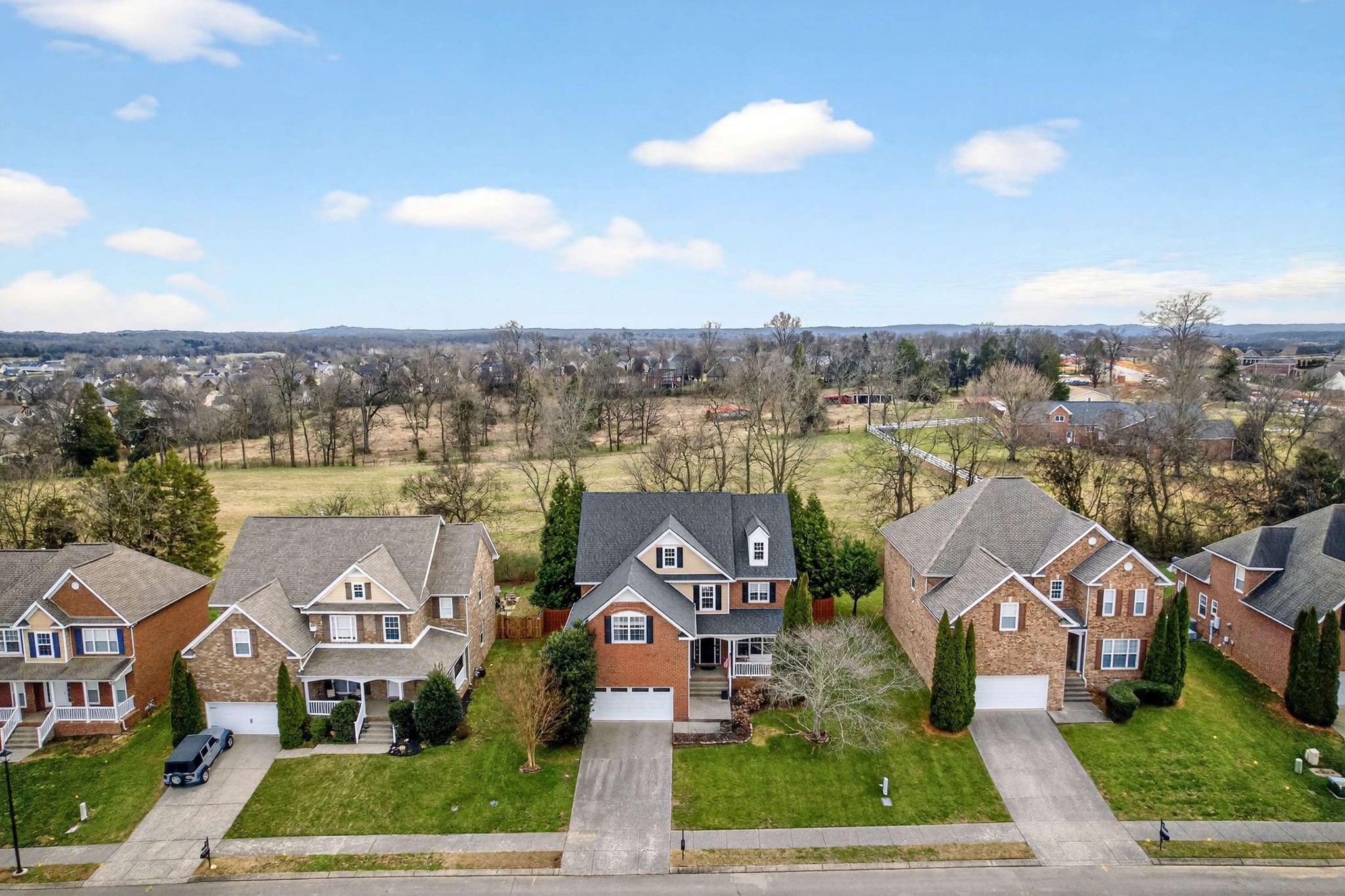 1012 Belcor Drive Spring Hill, TN 37174 - Photo 37 of 40 a view of a city with tall buildings