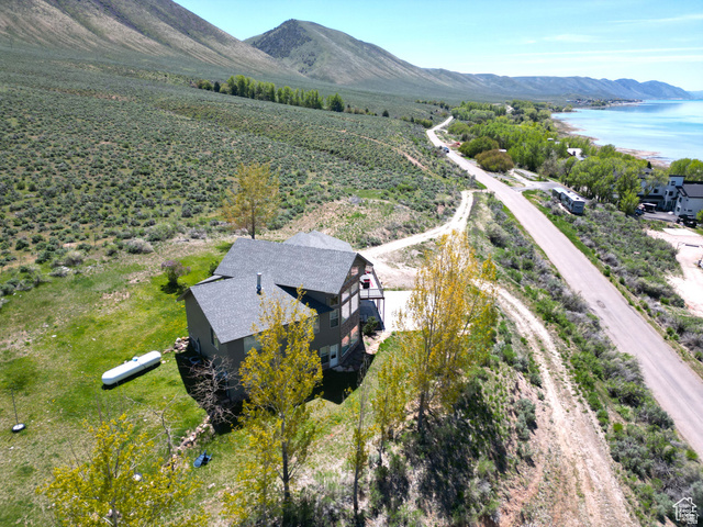 1940 East Shore Road St. Charles, ID 83272 - Photo 51 of 64 Aerial view of sparsely populated area featuring a mountain backdrop