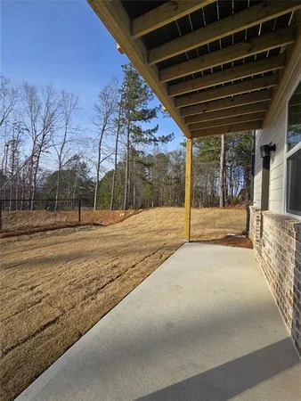 a view of backyard with barn