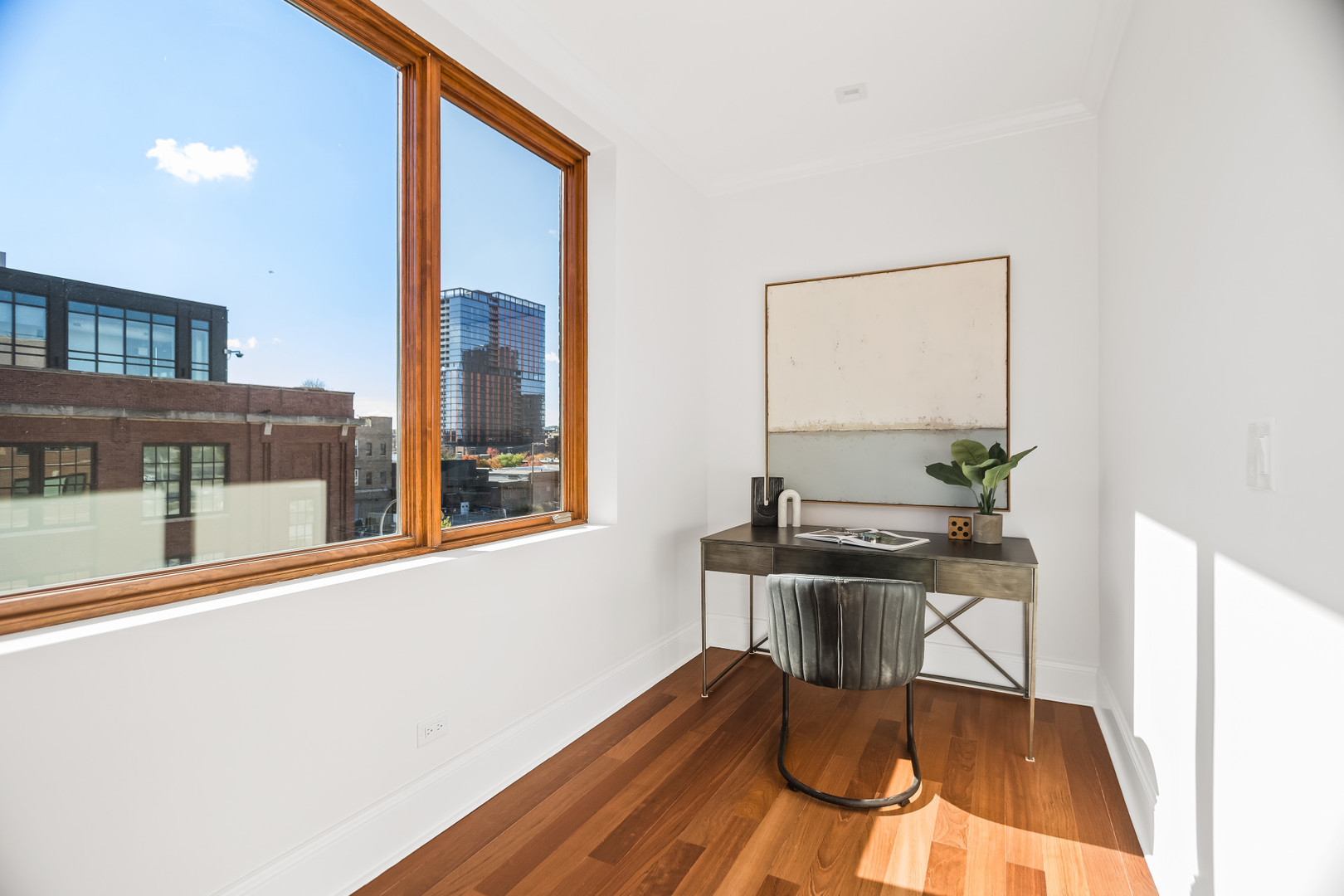 1152 West Fulton Market, Unit 4A Chicago, IL 60607 - Photo 10 of 19 a view of a dining room with furniture window and wooden floor