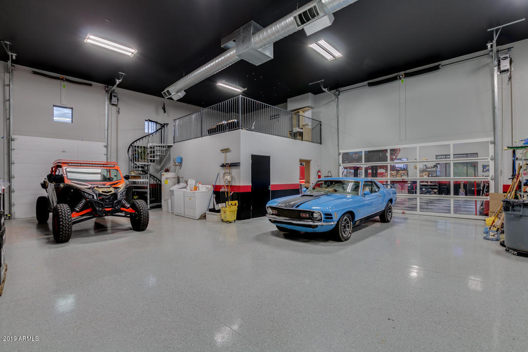 318 West Rock View Road Phoenix, AZ 85085 - Photo 69 of 105 a car is parked in a garage
