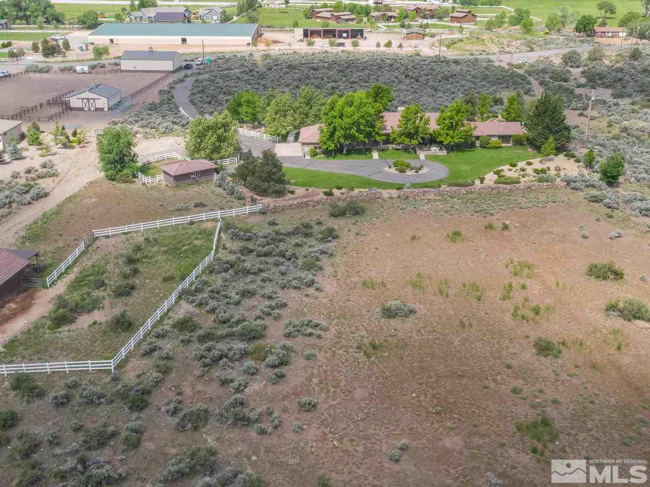 2450 Rhodes Road Reno, NV 89521 - Photo 1 of 25 a view of a yard with a street
