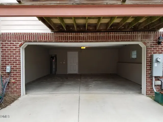 a view of a balcony with furniture and a fireplace