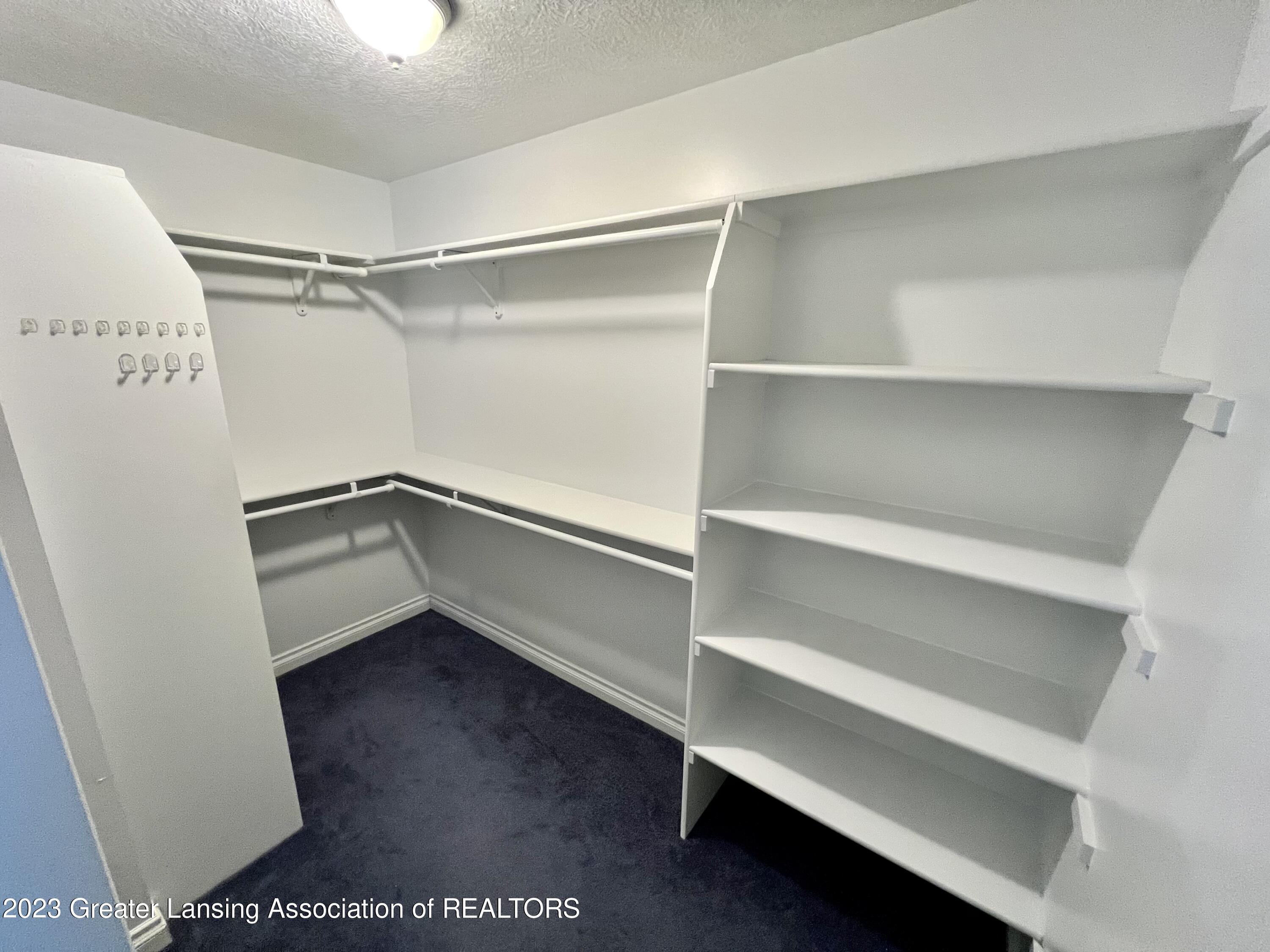 3814 Keller Road Holt, MI 48842 - Photo 22 of 35 Master walk in closet