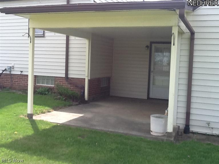9850 West Pleasant Valley Road Parma, OH 44130 - Photo 12 of 15 Back yard covered patio (10x16) is a good place to get out of the sun and relax.