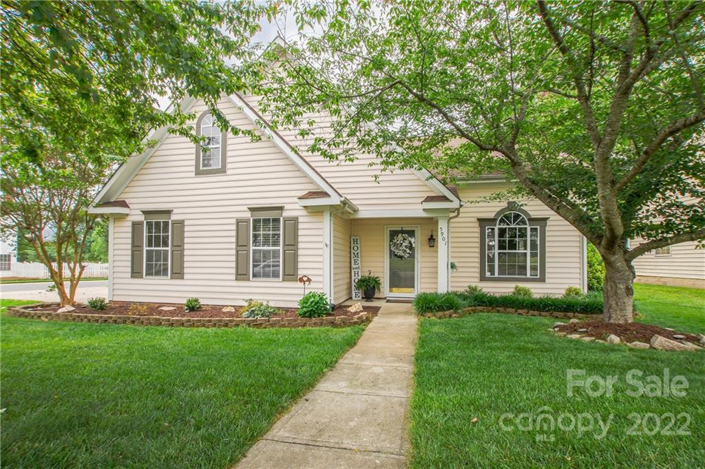 5901 Creft Circle Indian Trail, NC 28079 - Photo 1 of 26 a front view of a house with a garden and yard