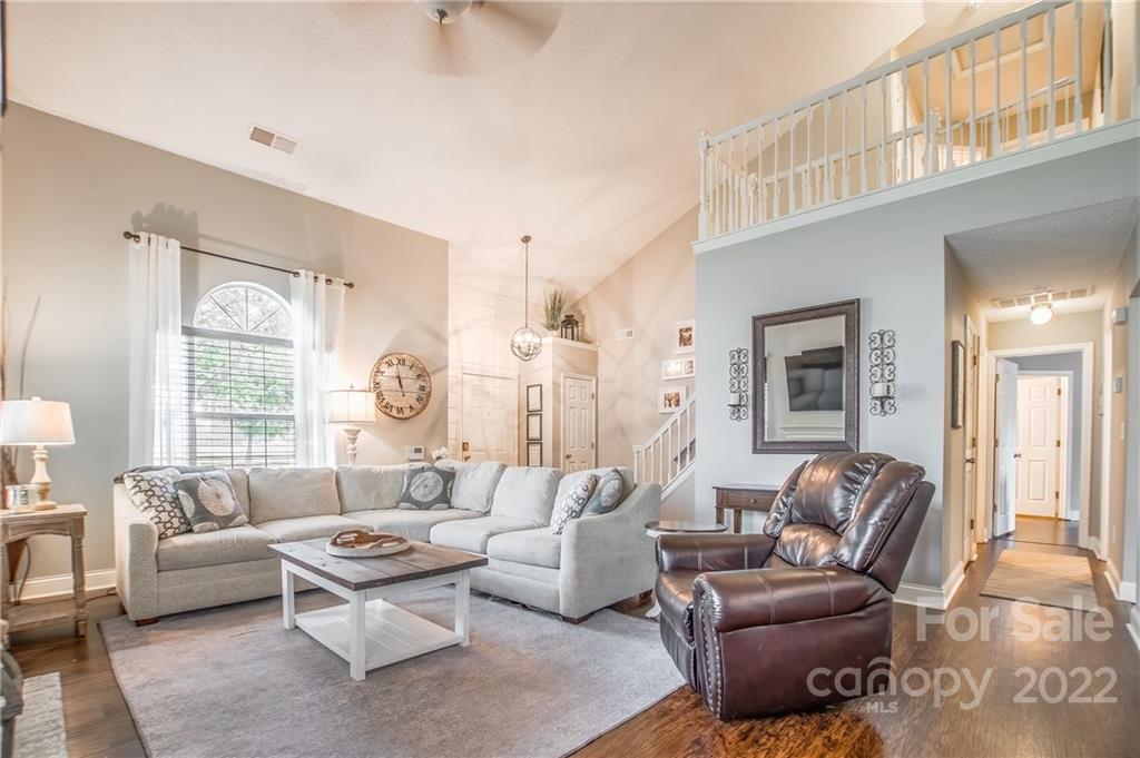 5901 Creft Circle Indian Trail, NC 28079 - Photo 5 of 26 a living room with furniture or couch and a large window