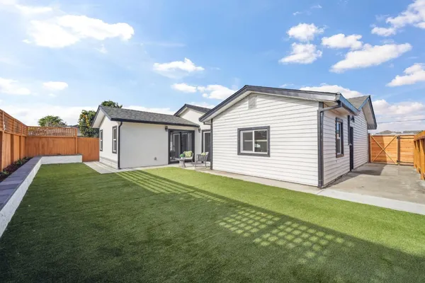 a view of a backyard with a garden