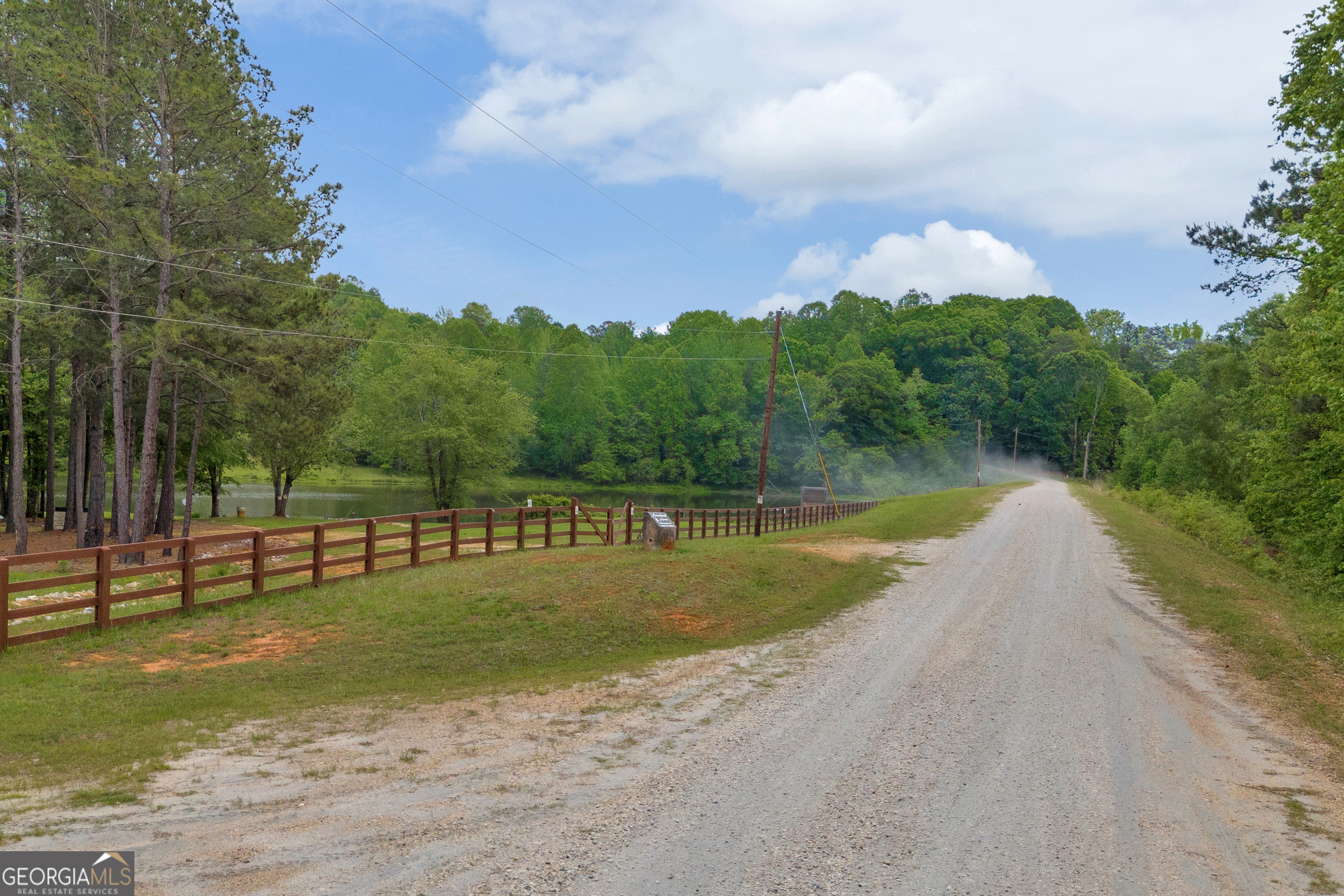 1120 Combs Avenue Martin, GA 30557 - Photo 13 of 56 a view of a swimming pool with a yard