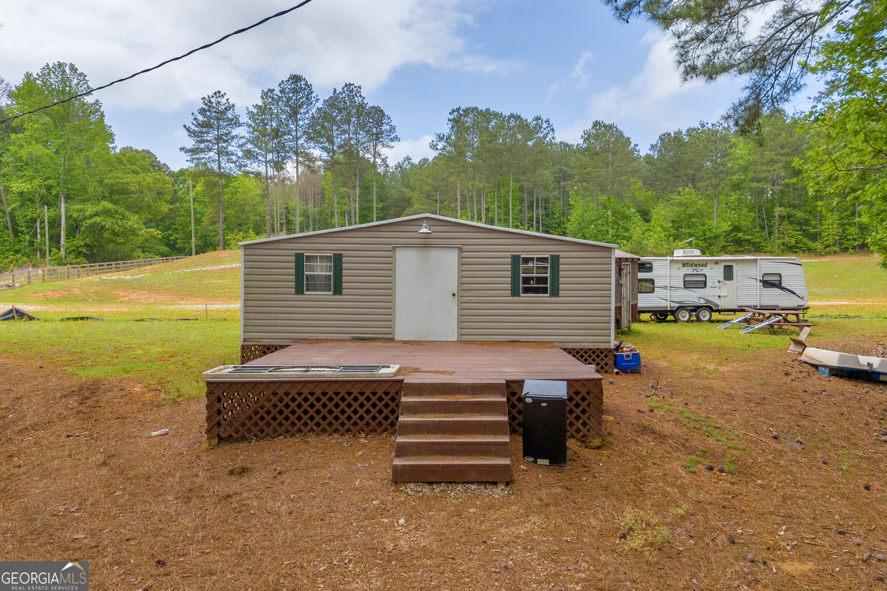 1120 Combs Avenue Martin, GA 30557 - Photo 14 of 56 a view of a backyard with sitting area