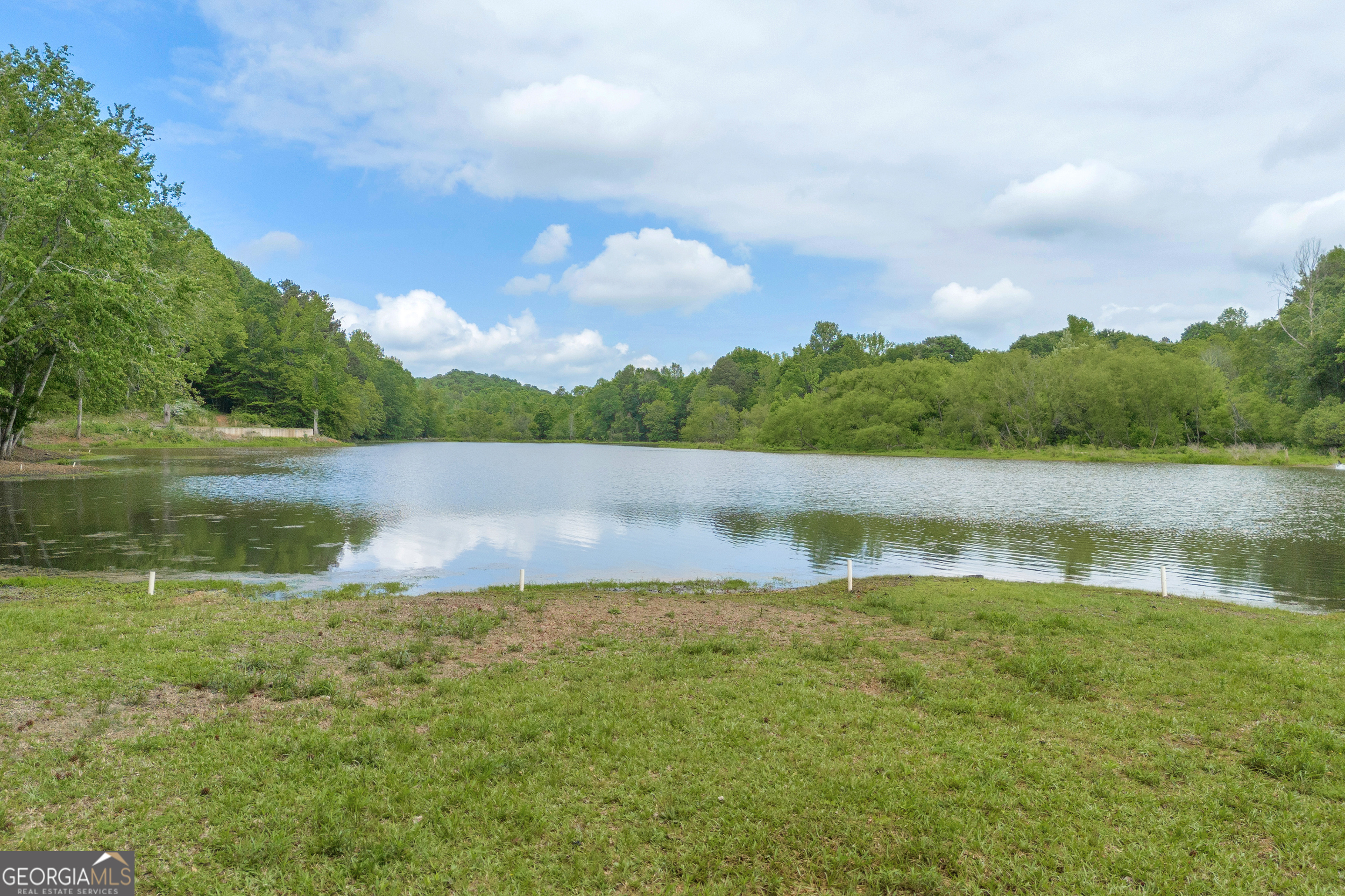 1120 Combs Avenue Martin, GA 30557 - Photo 15 of 56 a view of lake with houses in the back