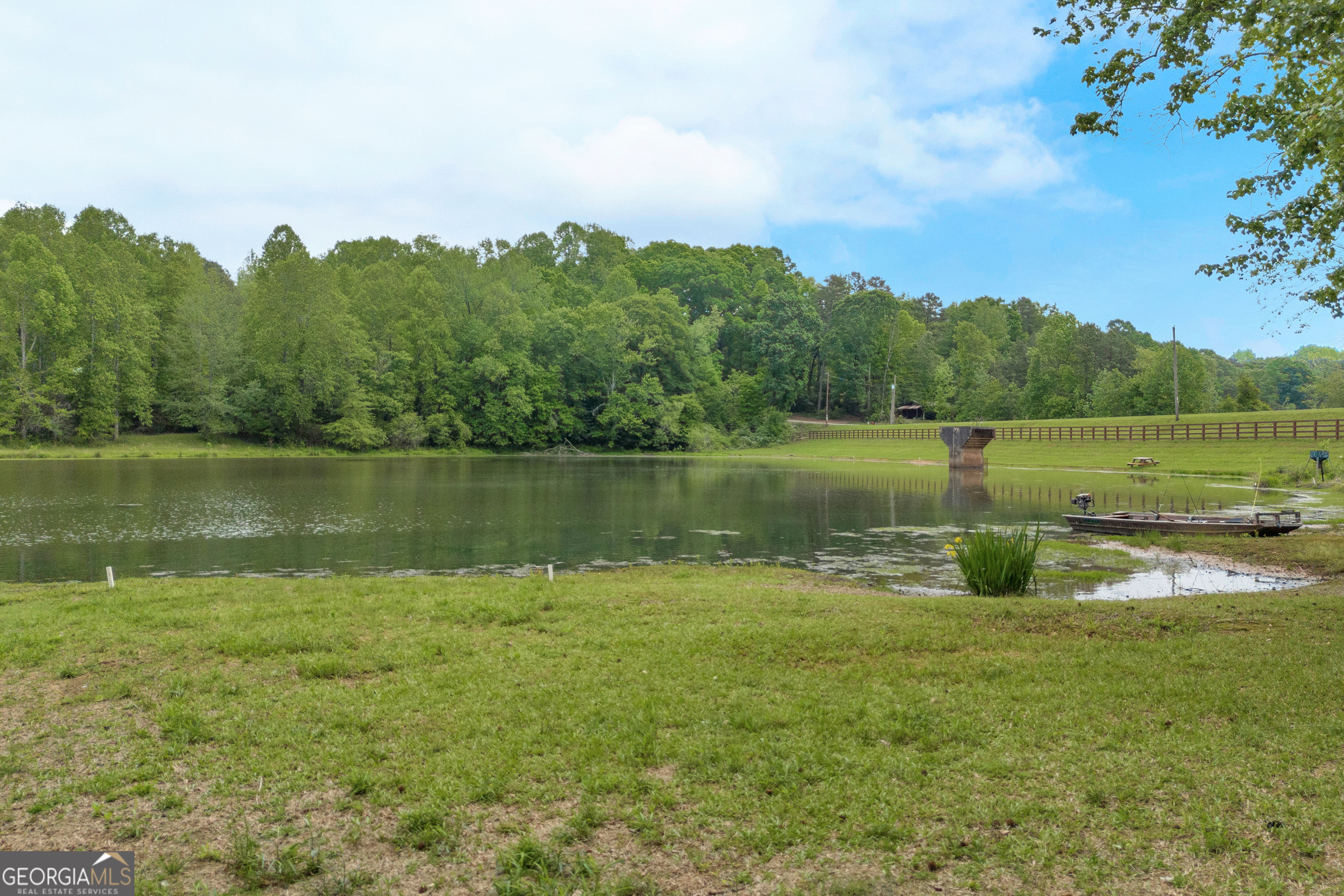 1120 Combs Avenue Martin, GA 30557 - Photo 16 of 56 a view of a lake with houses in the back