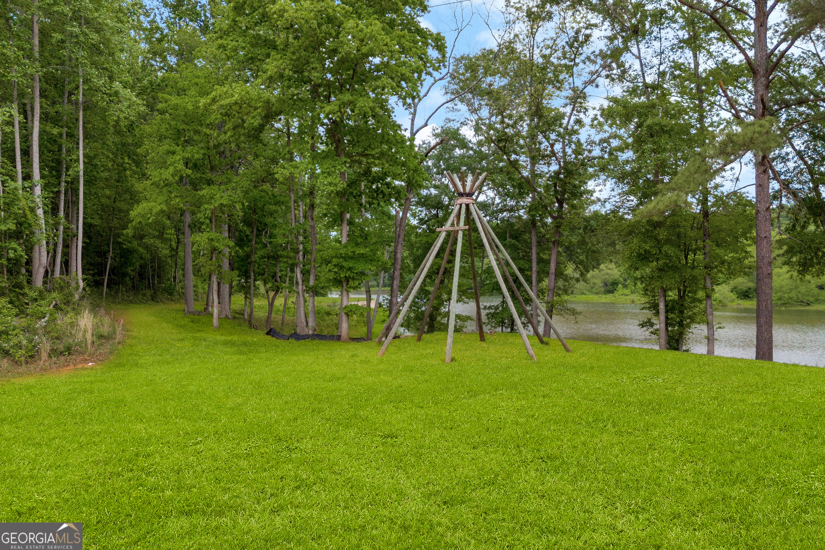 1120 Combs Avenue Martin, GA 30557 - Photo 39 of 56 a view of a backyard with a slide