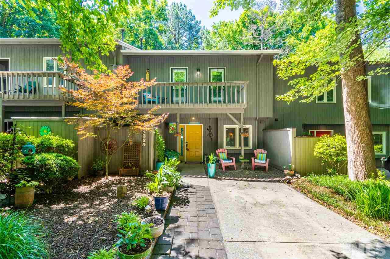4339 Southwind Drive Raleigh, NC 27613 - Photo 1 of 24 a front view of a house with a yard