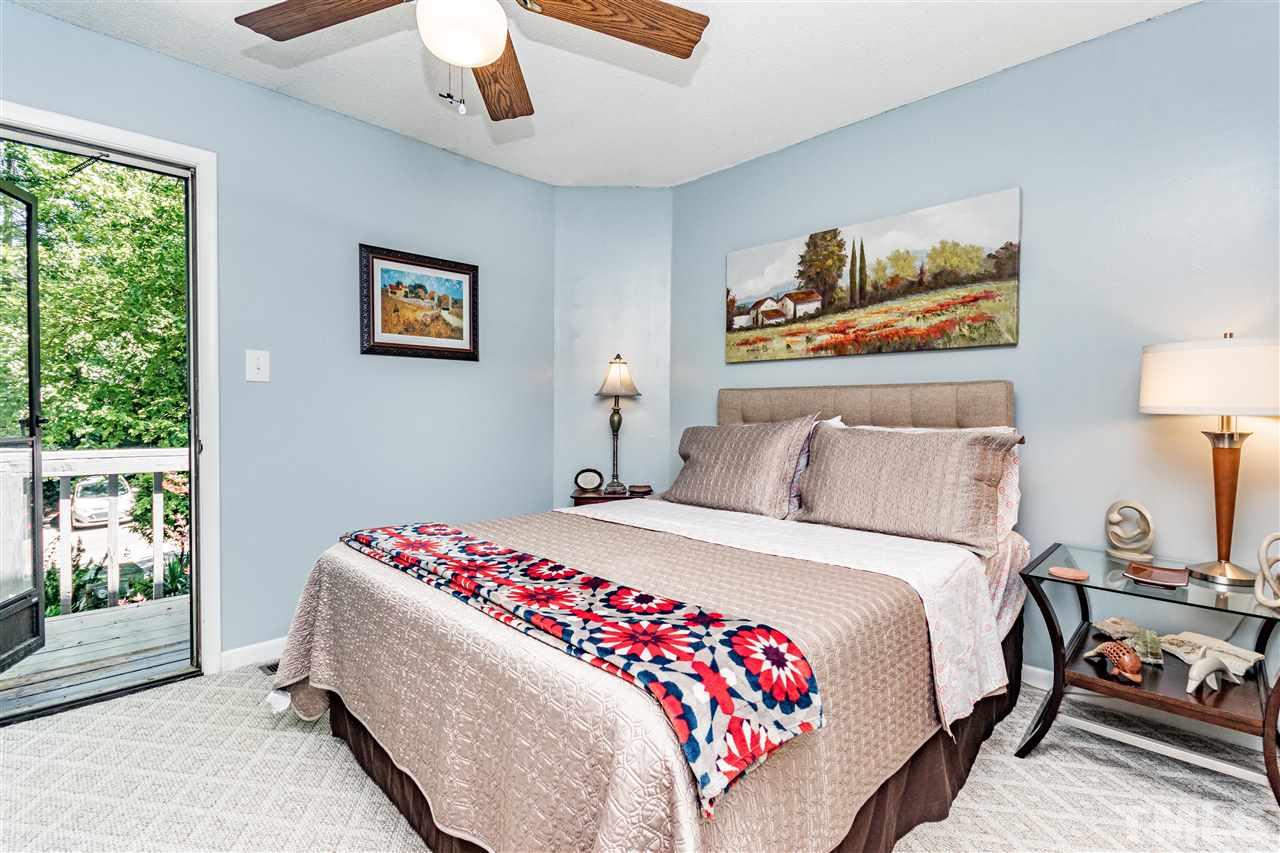 4339 Southwind Drive Raleigh, NC 27613 - Photo 14 of 24 a bedroom with bed and a window