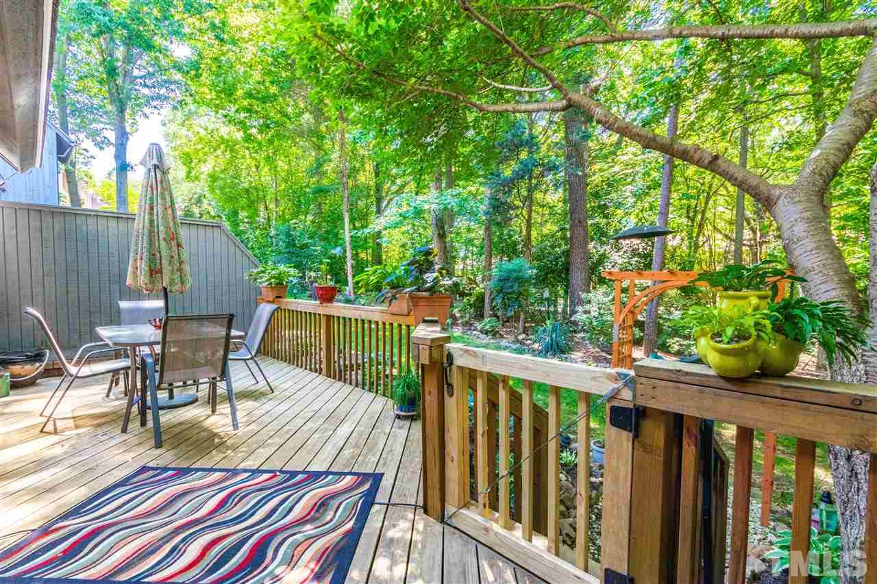 4339 Southwind Drive Raleigh, NC 27613 - Photo 20 of 24 a view of a chair and table in the balcony