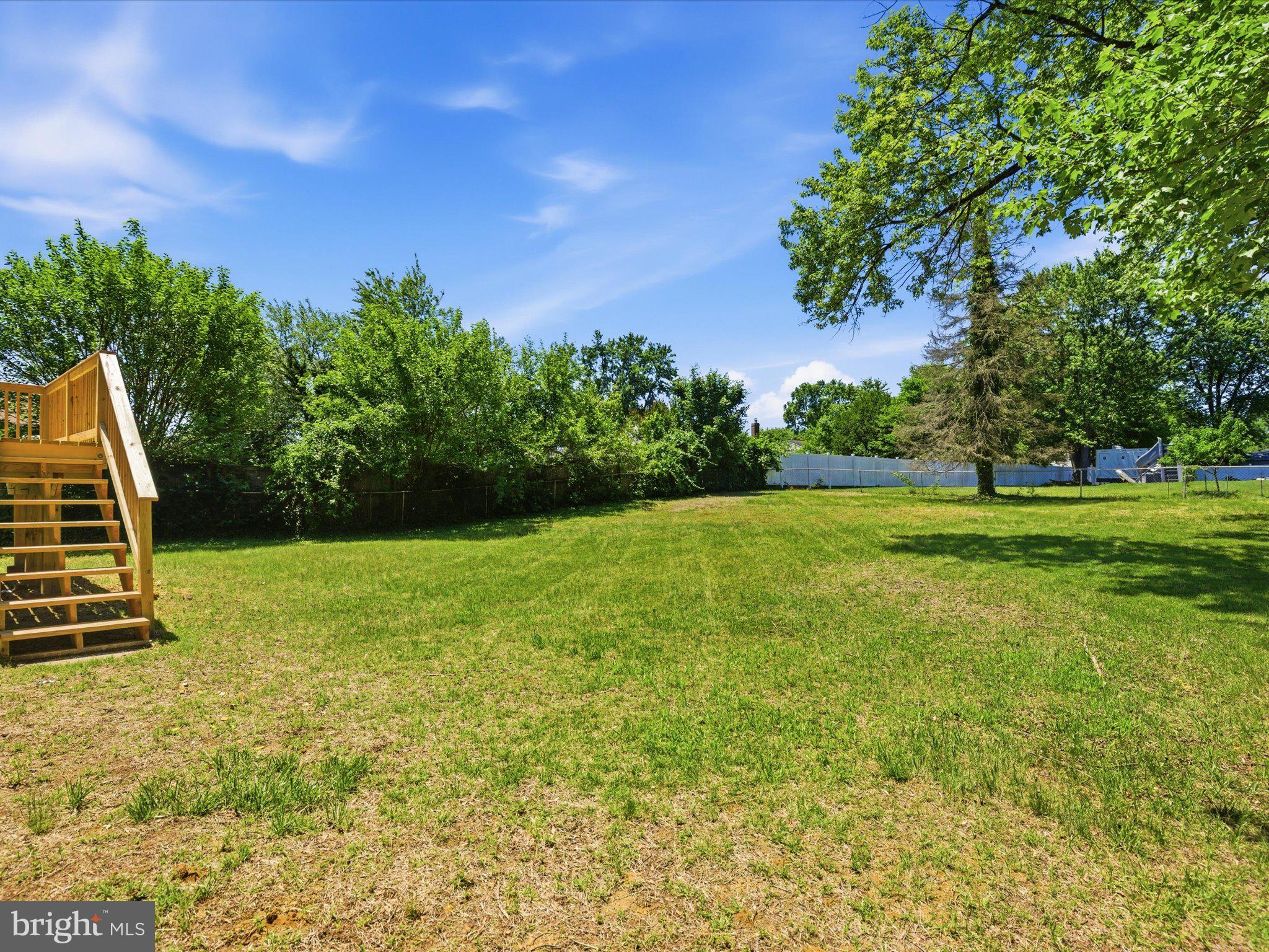 6314 West Vein Road Bowie, MD 20720 - Photo 7 of 28 a view of a golf course with a garden