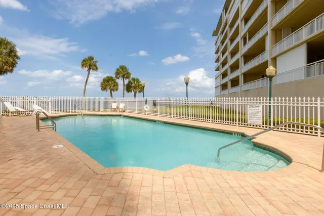 a view of two chairs in patio