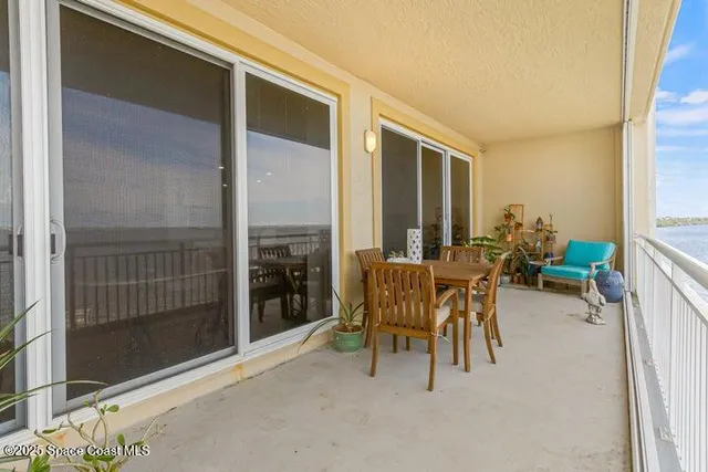 a room that has a table and a chair in it