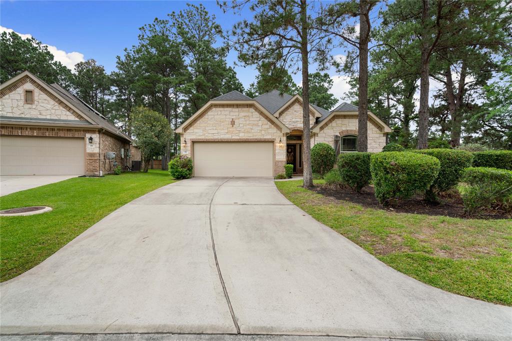 a front view of a house with yard