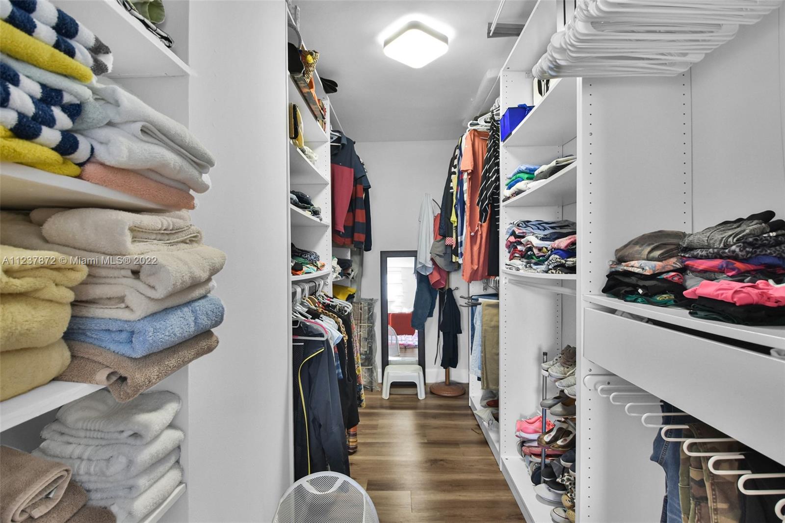 South Central Beach Hollywood, FL 33019 - Photo 12 of 30 a view of a closet with storage and utility room