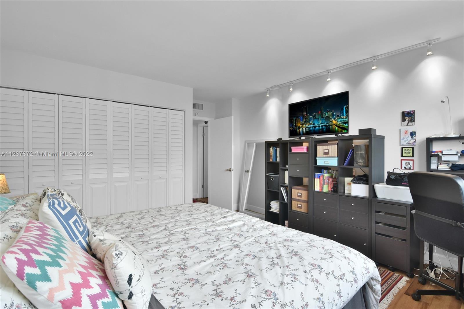 South Central Beach Hollywood, FL 33019 - Photo 15 of 30 a bedroom with a bed and furniture