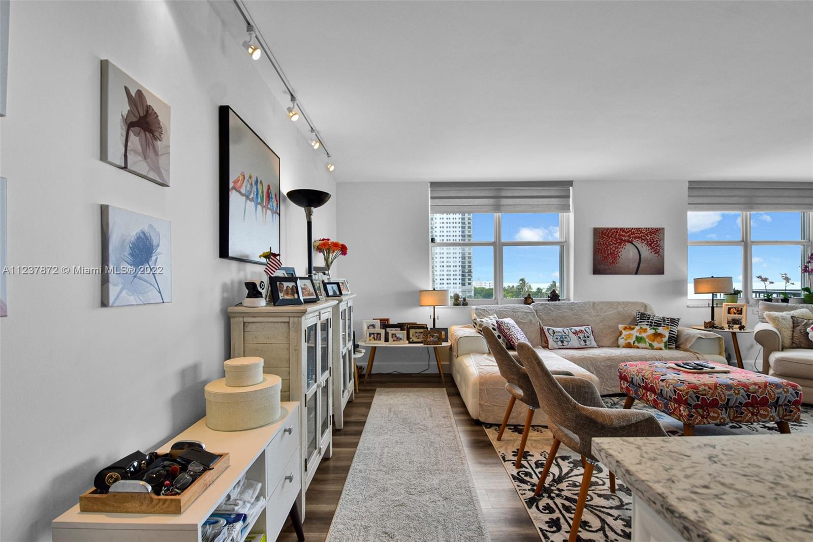 South Central Beach Hollywood, FL 33019 - Photo 18 of 30 a living room with furniture and a window