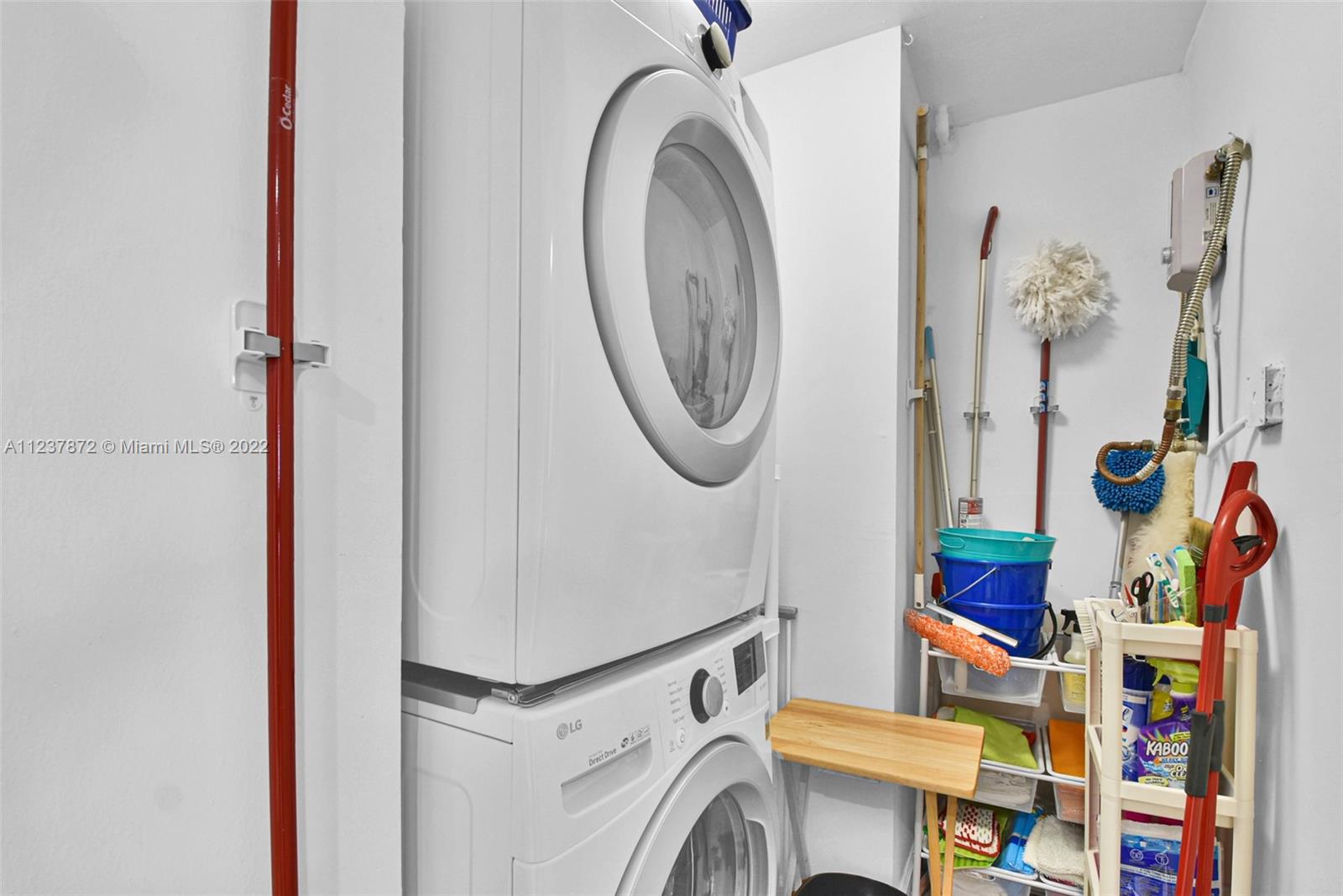South Central Beach Hollywood, FL 33019 - Photo 26 of 30 a utility room with dryer and washer