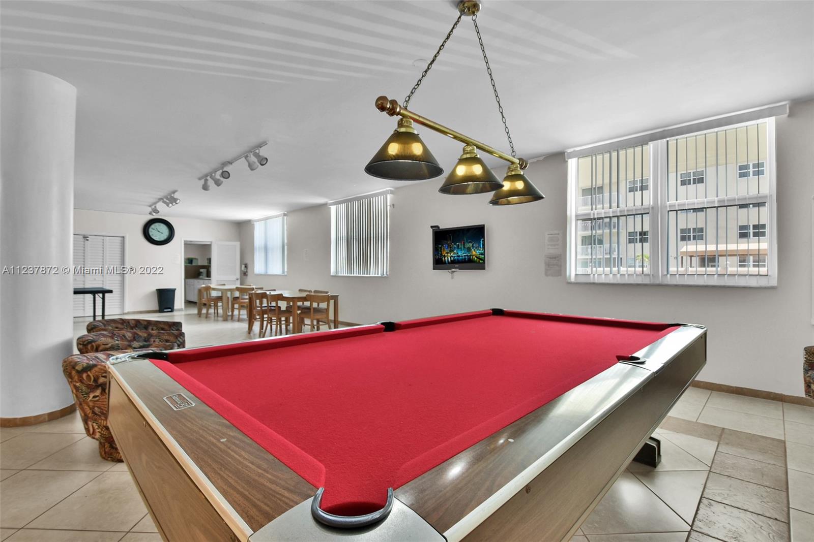 South Central Beach Hollywood, FL 33019 - Photo 29 of 30 a room with pool table and windows