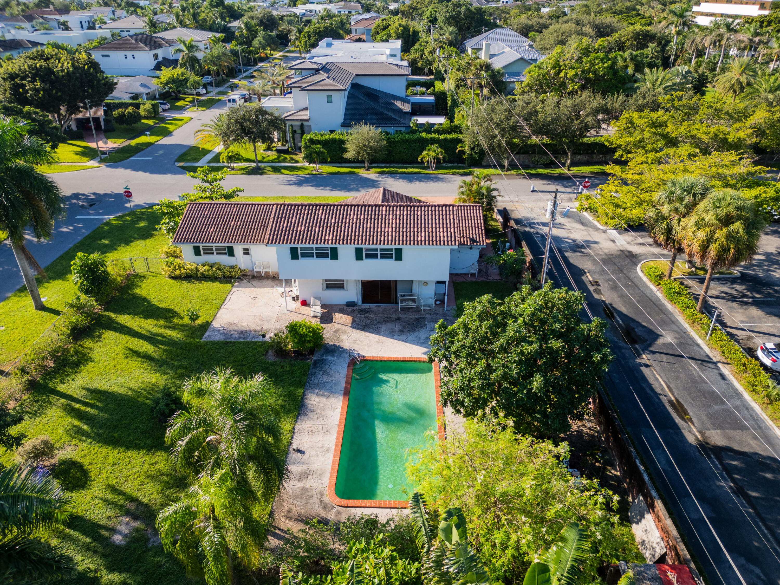 233 Northeast 11th Street Boca Raton, FL 33432 - Photo 3 of 6 an aerial view of a house with a garden