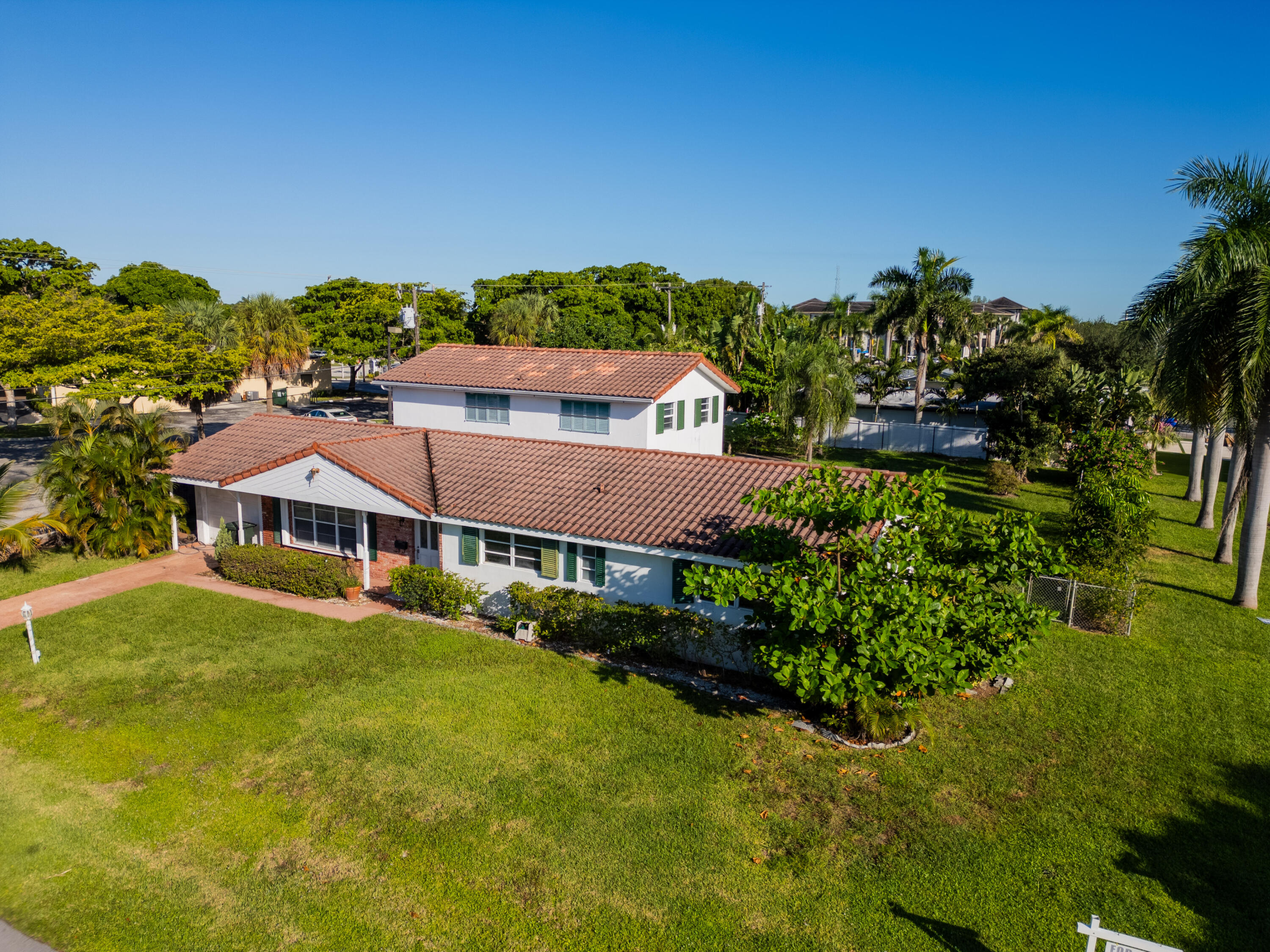 233 Northeast 11th Street Boca Raton, FL 33432 - Photo 4 of 6 a view of house with garden