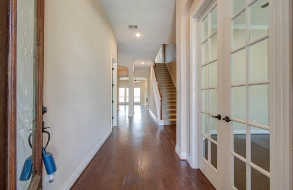 a view of entryway with wooden floor