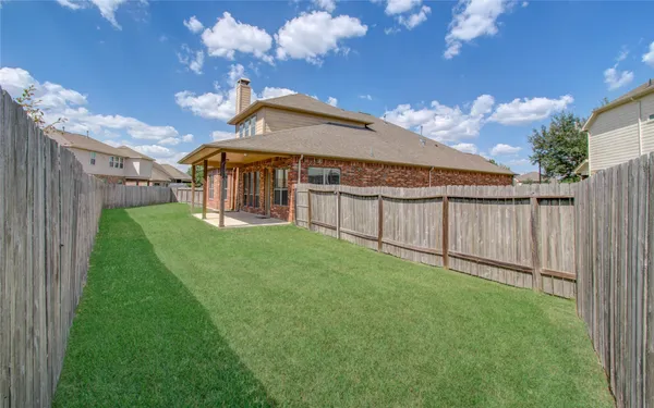 a view of a backyard with a garden