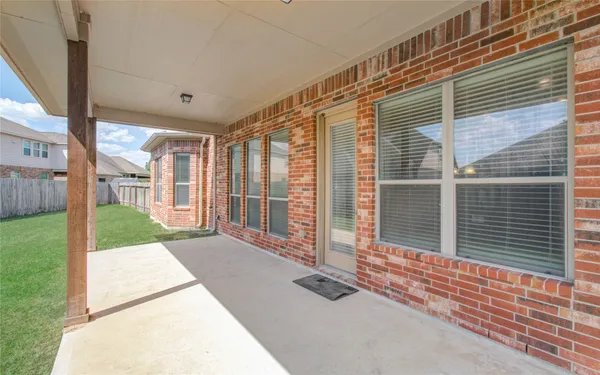 a view of porch with a backyard