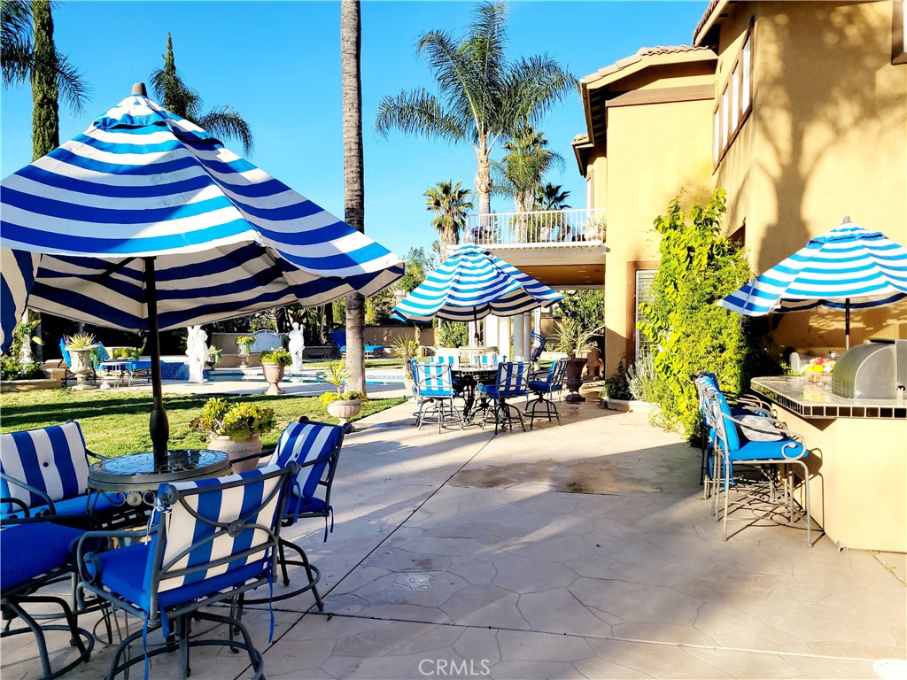 14119 Ashton Lane Riverside, CA 92508 - Photo 5 of 47 a view of an outdoor space with a table and chairs