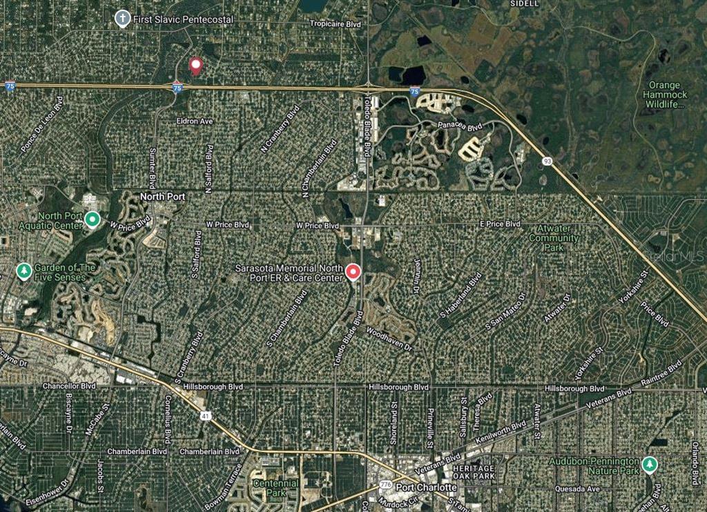 4340 Lagrange Avenue North Port, FL 34286 - Photo 14 of 14 a view of a fence and a floor to ceiling window