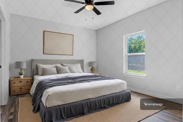 a bedroom with a bed and window