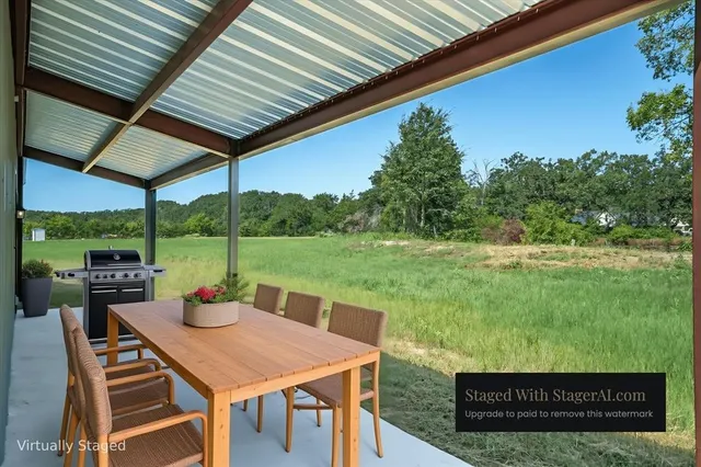 a view of a lake with green space