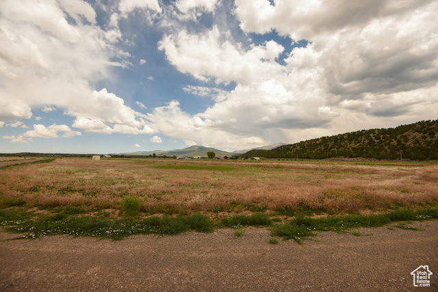 St, Unit 6 Beaver, UT 84713 - Photo 10 of 27 View of mountain background with rural landscape
