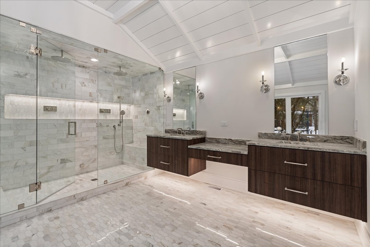 819 Wagner Road Glenview, IL 60025 - Photo 13 of 20 a large bathroom with a sink and a large mirror