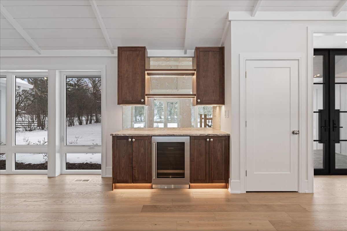 819 Wagner Road Glenview, IL 60025 - Photo 4 of 20 a kitchen with stainless steel appliances granite countertop a refrigerator and a stove top oven