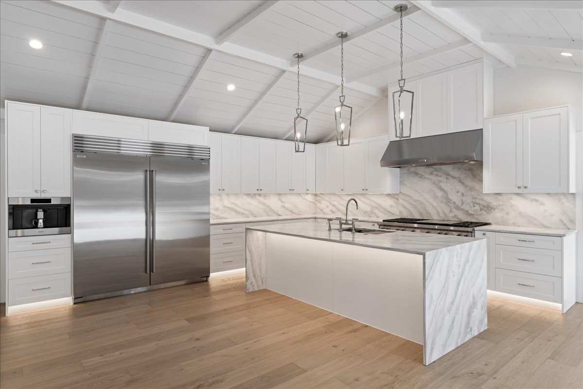 819 Wagner Road Glenview, IL 60025 - Photo 6 of 20 a kitchen with granite countertop a refrigerator and a stove