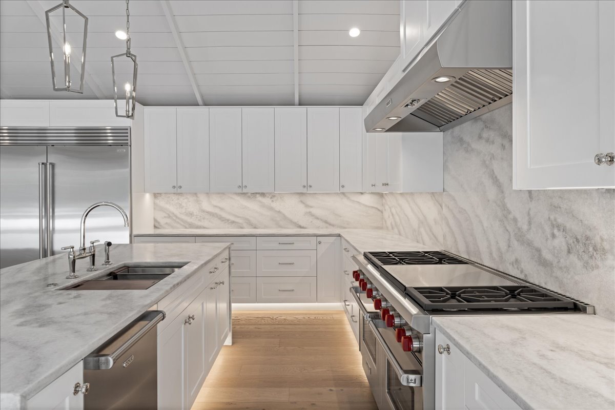 819 Wagner Road Glenview, IL 60025 - Photo 7 of 20 a kitchen with granite countertop a sink stove and cabinets