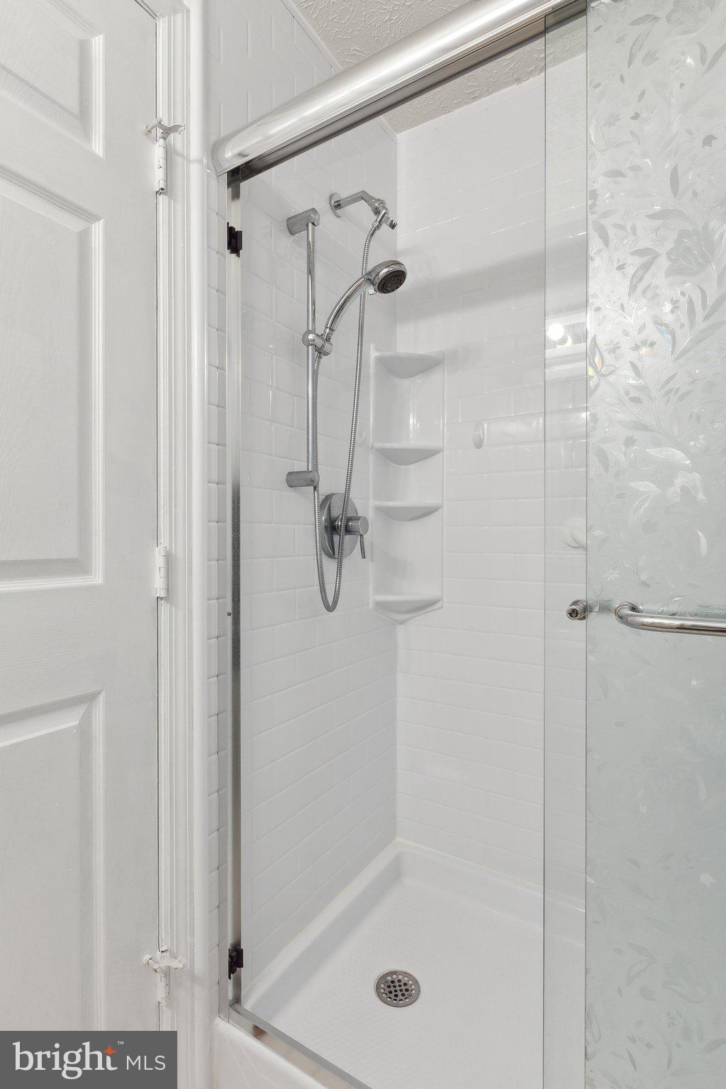 815 Deering Road, Unit 7H Pasadena, MD 21122 - Photo 19 of 24 a bathroom with a shower