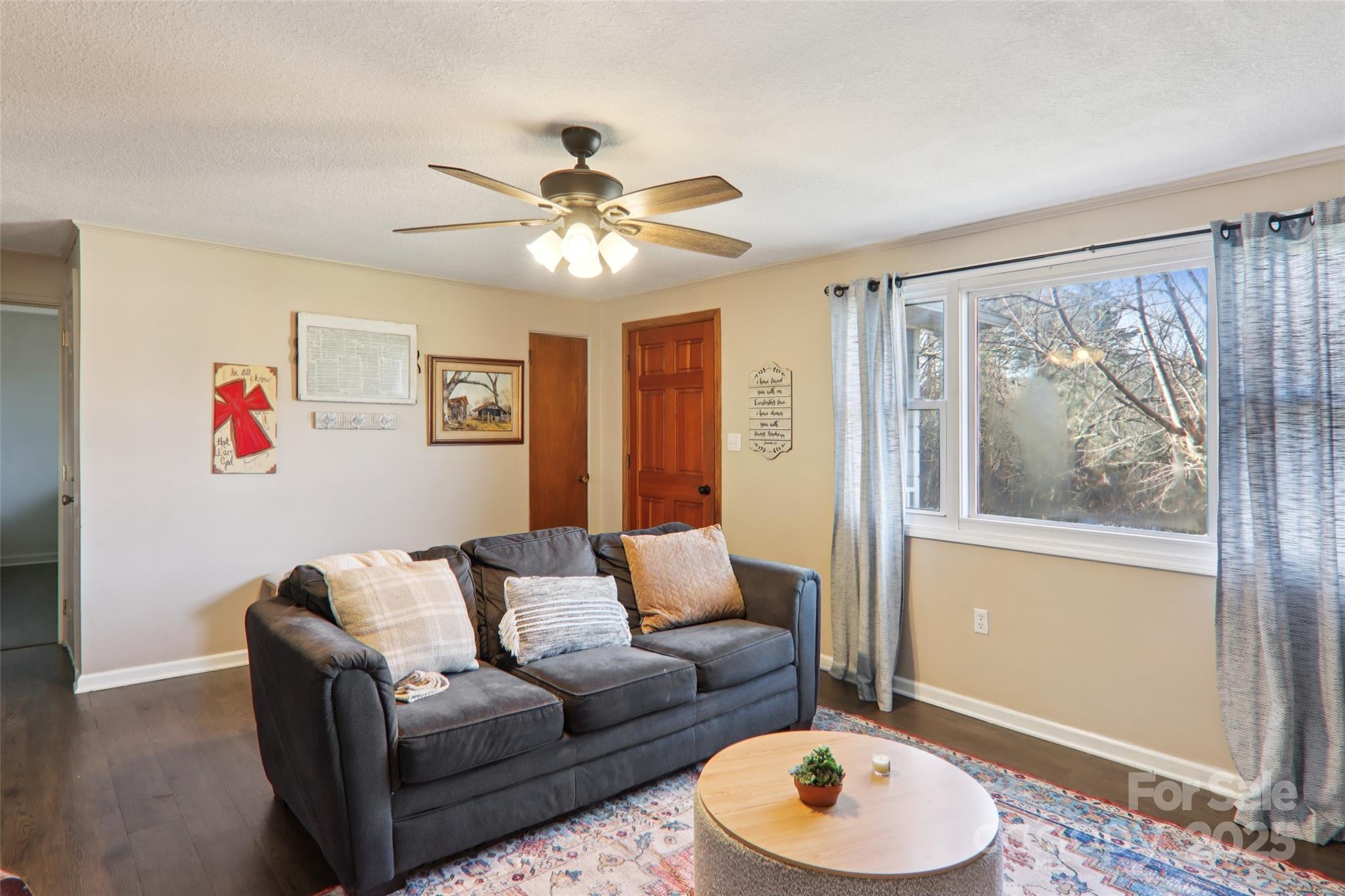 57 Bittersweet Trail Canton, NC 28716 - Photo 18 of 40 a living room with furniture and a window
