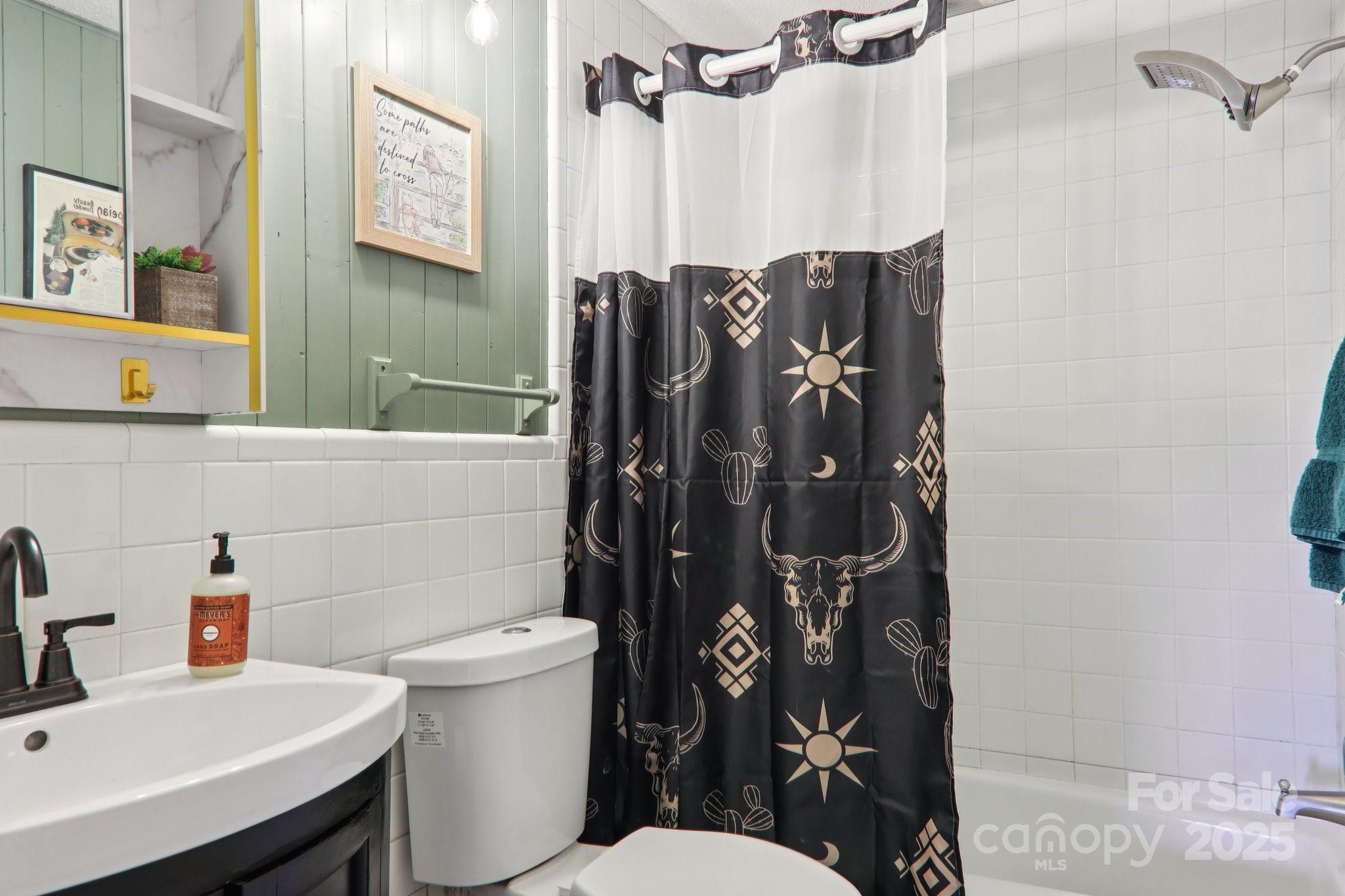 57 Bittersweet Trail Canton, NC 28716 - Photo 20 of 40 a bathroom with a toilet and a sink