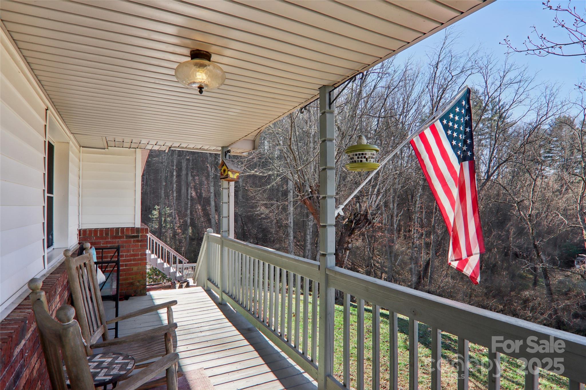57 Bittersweet Trail Canton, NC 28716 - Photo 3 of 40 a view of a balcony with furniture