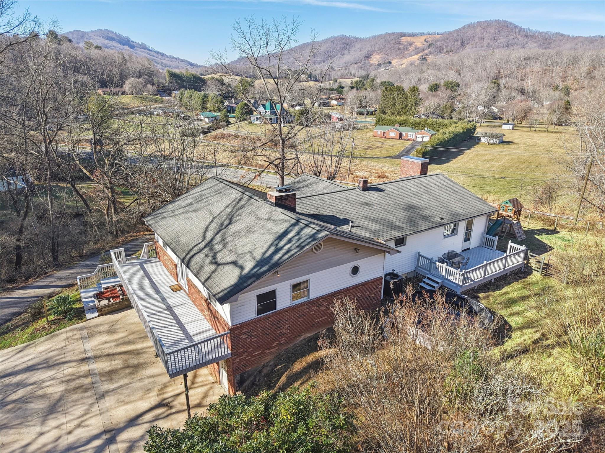 57 Bittersweet Trail Canton, NC 28716 - Photo 36 of 40 a view of a terrace with a lake view